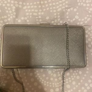 Silver clutch.